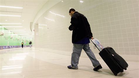 Popular travel destination to ban rolling luggage - ABC7 Los Angeles