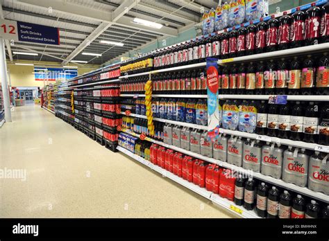 Tesco drinks aisle hi-res stock photography and images - Alamy