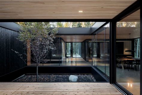 Walls Of Glass Allow The Forest Views To Enter This Home