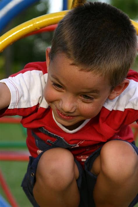 Menino 10 Do Campo De Jogos Foto De Stock Imagem De Prole Playground