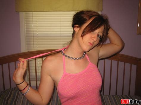 GND Ruby Stripping And Fingering Her Shaved Pussy 10 Photos