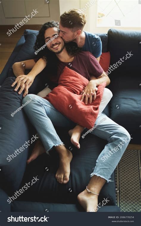 Male Gay Couple Caressing On Couch Stock Photo 2086778254 Shutterstock