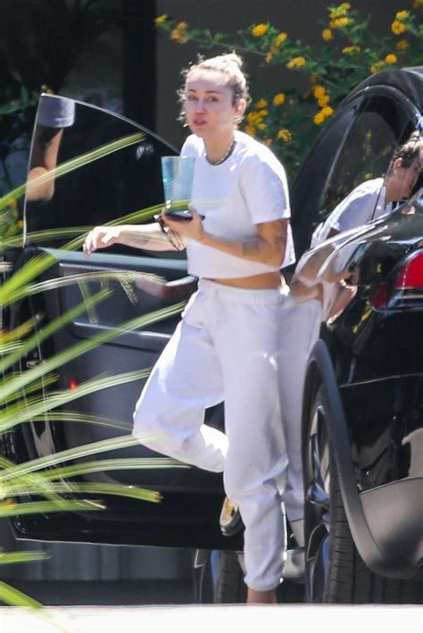 Miley Cyrus in a White Outfit Visits Friends in Malibu 08/05/2021 ...