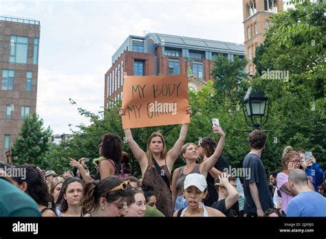 The Protesters Holding Out Cardboard Signs About Body Freedom After