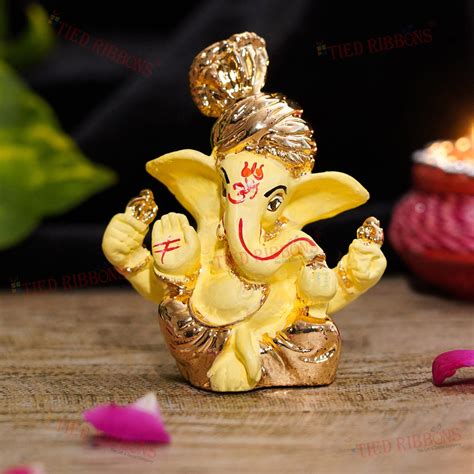 Buy Tied Ribbons Ganesh Idol For Car Dashboard Showpiece For Study