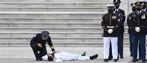 Honor Guard Member Collapses As He Awaits John Lewis Casket At The