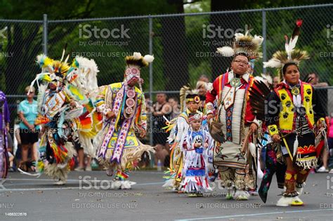 Male Native Americans Of Hochunk Nation Performing Pow Wow In Front Of ...