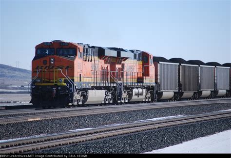 BNSF 6306 And BNSF 6197 Push A Loaded Coal Train East As Rear DPU Units