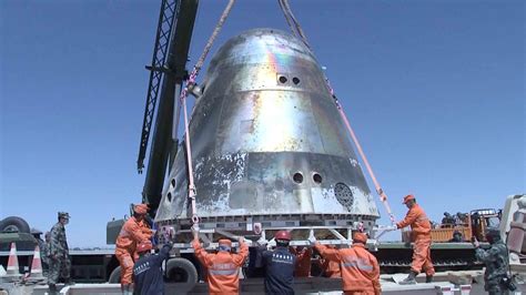 return capsule  chinas manned spaceship arrives  launch center cgtn