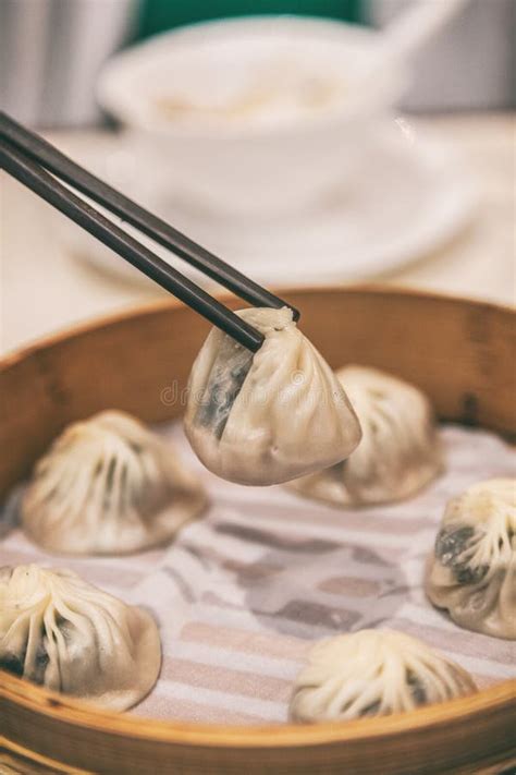 Chinese Restaurant Eating Xiao Long Bao Dumplings Steamed Soup Dumpling