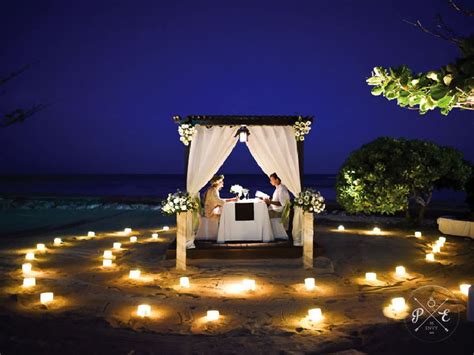 Romantic beach dinner celebration arranged by Proposalenvy #candles # ...