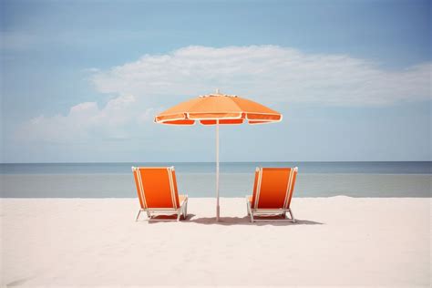 Lounge chairs beach furniture umbrella. | Premium Photo - rawpixel