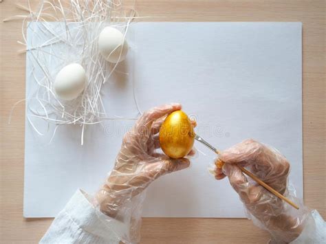 Painting of Golden Eggs for the Spring Holiday of Easter. Stock Image - Image of spring ...