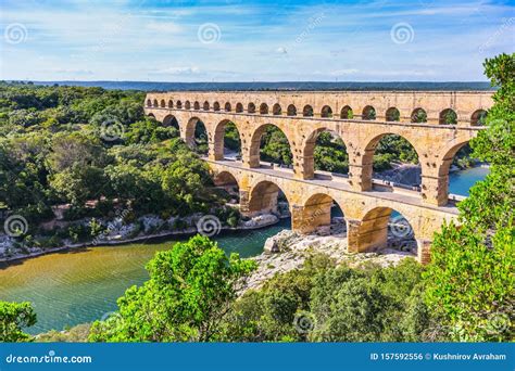 Three-tiered Aqueduct Pont Du Gard and Natural Park Stock Photo - Image ...