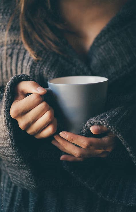 Woman With A Cup Of Tea In Her Hands By Stocksy Contributor Eva