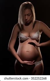 Naked Pregnant Woman On Black Background Stock Photo Shutterstock