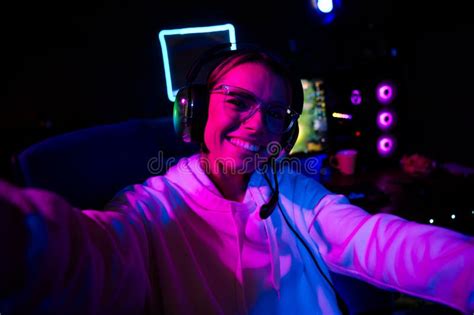 Photo Of Cute Lovely Blonde Girl Take Selfie Photo Play Gamer Computer Game Late Night Blue
