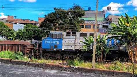 LOCOMOTIVA ESPECIAL 6028 NO trem de minério carregado 5 Dash 9BB