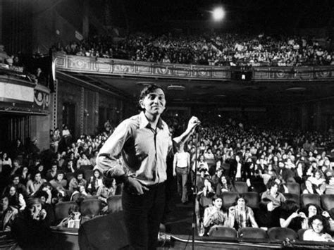 Rock Promoter Bill Graham Onstage With Audience Visible At Fillmore