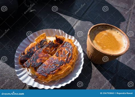 grilled bun butter  muska bun  hot indian spiced tea served
