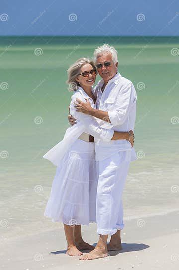 Happy Senior Couple Embracing On Tropical Beach Stock Image Image Of