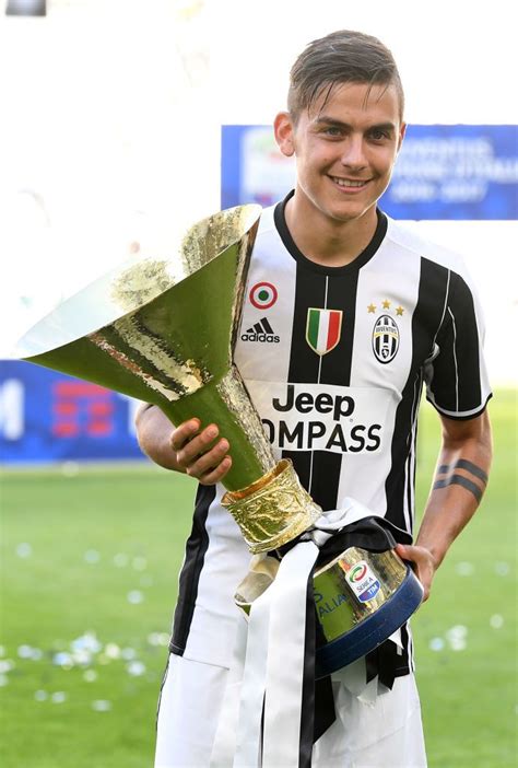 Paulo Dybala Of Juventus Fc Celebrates With The Trophy After The Artofit