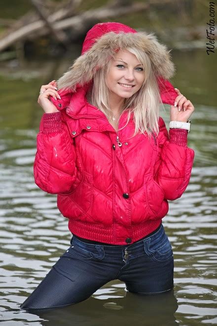 Wetlook By Girl In Fully Wet Jacket Tight Jeans And Shoes On Lake