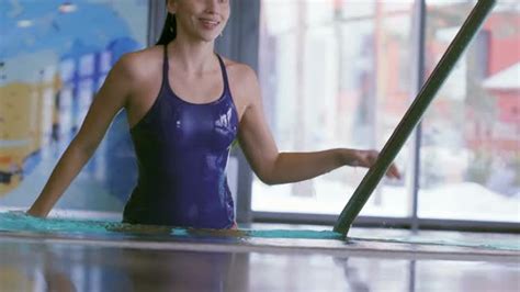 Woman Emerging From Water In Swimming Pool Stock Footage Videohive