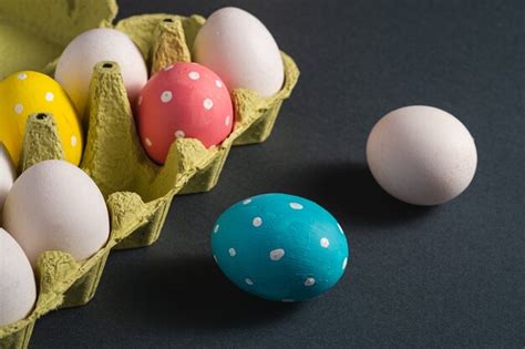 Premium Photo Colorful Polka Dot Easter Eggs In Egg Tray On Dark Grey