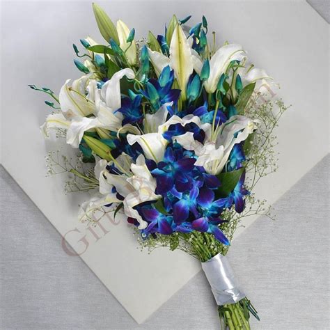 Send Online Bunch White Lilies Blue Orchids Flower Bouquet Delivery in Jaipur | Gifty Basket