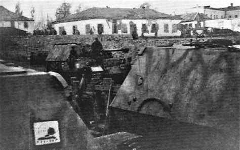 An Old Black And White Photo Of Some Buildings