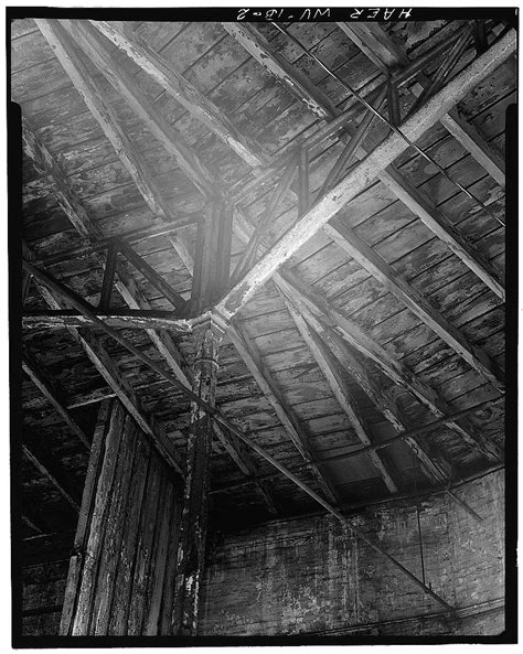 Interior Detail View Of Connection Between Cast Iron Roof Trusses