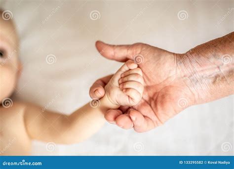 Hands Of Young Great Grandson And Old Great Grandmother Beautiful