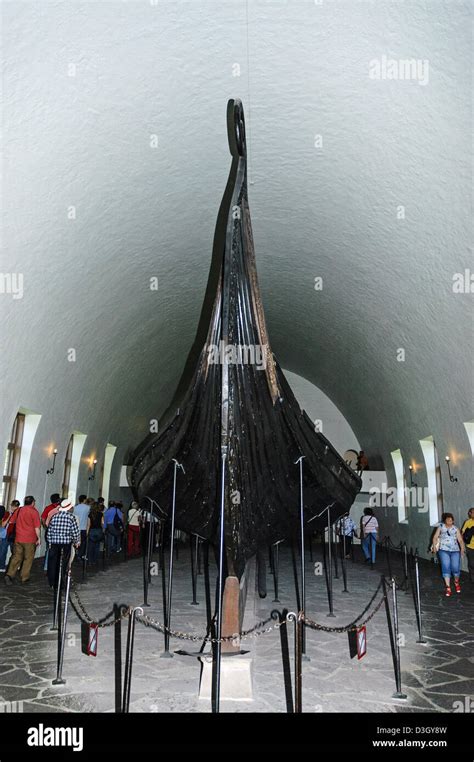 Tourists Walk Around The Oseberg Ship A Well Preserved Viking Ship