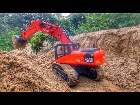 Story Line Rc Excavator Hitachi Wl Making Road On Slope Youtube