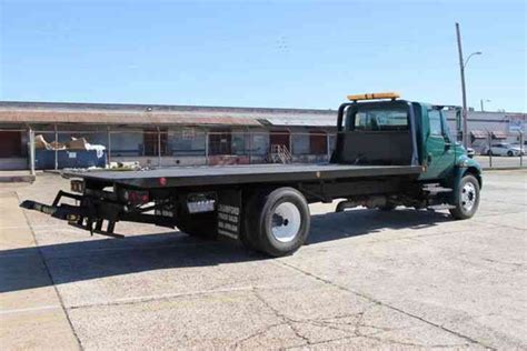 International 2010 Flatbeds And Rollbacks