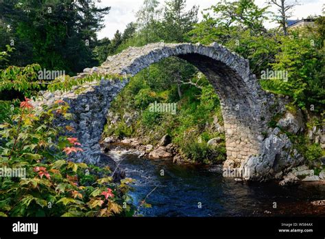 Old Packhorse Bridge in Carrbridge, Scotland, built in 1717. It is the oldest stone bridge In ...