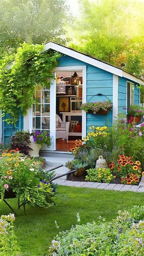 English Cottage Garden with Small Blue Shed and Flowers