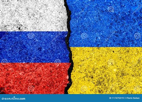 Flags Of Russia And Ukraine Painted On Cracked Wall Background Russia