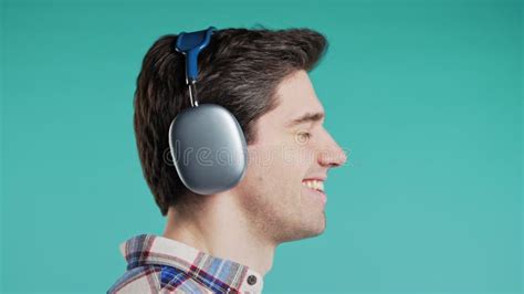 Positive Handsome Man Listening Music Enjoying Dance With Modern