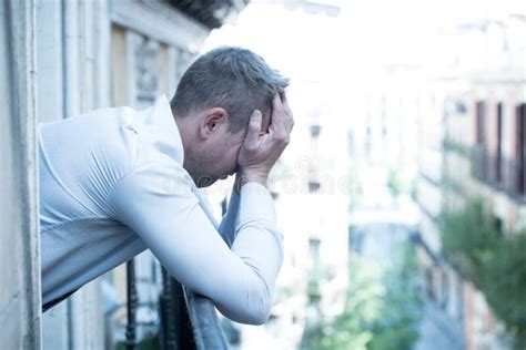 Sad Depressed Man Feeling Low And Sad In Mental Health Concept Stock