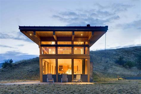 Compact Sustainable Cabin In Washington Partially Buried Into The