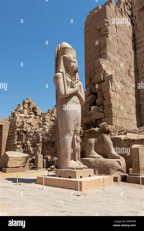 The Statue Of Ramses Ii With His Daughter Merit Amon In The Temple Of Amun Ra In Karnak Luxor