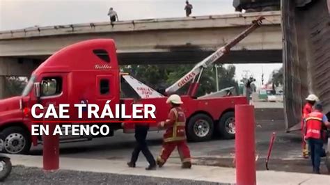 IMPACTANTE Tráiler de doble remolque cae de puente vehicular en