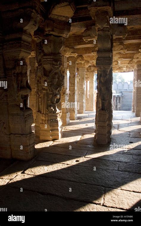 Hindu Deities Carved Into Stone Pillars At A Veerabhadra Temple In