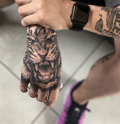 Hand Tiger Tattoo In Hand Tattoos For Guys Arm Tattoos For Guys