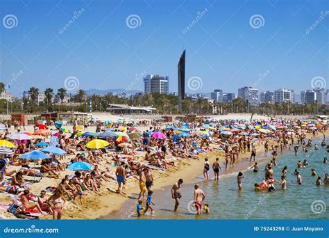 People At Platja Del Bogatell Beach In Barcelona Spain Editorial