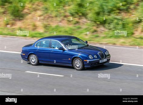 2002 Blue Jaguar S-Type V6, Car Saloon Petrol 2496 cc; travelling at ...