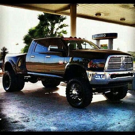 Gotta Love A Dually Jacked Up Trucks Diesel Trucks Dodge Trucks