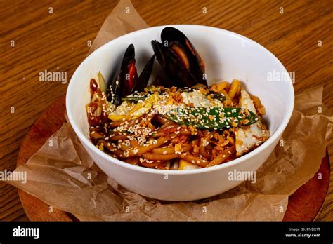 Pasta With Seafood And Sesam Seeds Stock Photo Alamy